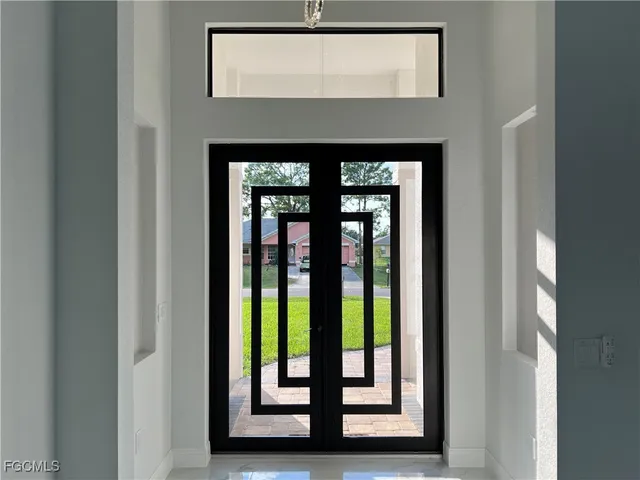 a front view of a house with a large window