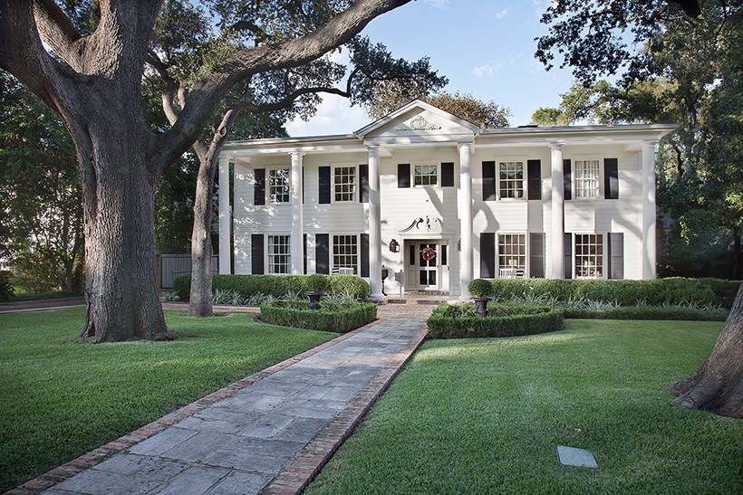 1606 Watchhill Road Austin, TX 78703 - Photo 1 of 1 a view of a white house next to a yard with big trees