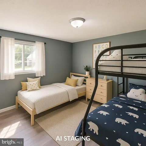a bedroom with furniture and a potted plant