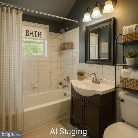 a bathroom with a sink mirror vanity and bathtub