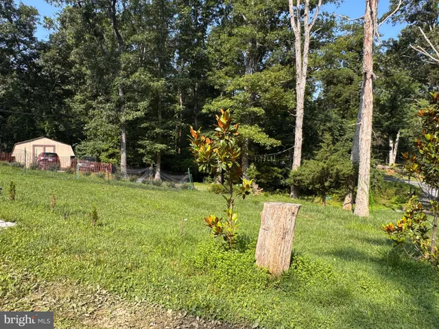 a swimming pool with wooden fence