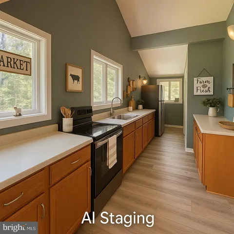 a large kitchen with stainless steel appliances granite countertop a sink and cabinets
