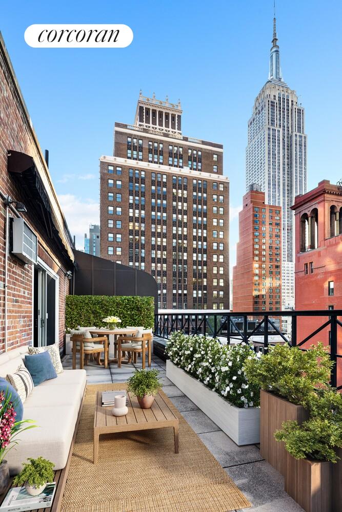220 Madison Avenue, Unit PHC Manhattan, NY 10016 - Photo 14 of 15 a view of a patio with couches table and chairs and potted plants