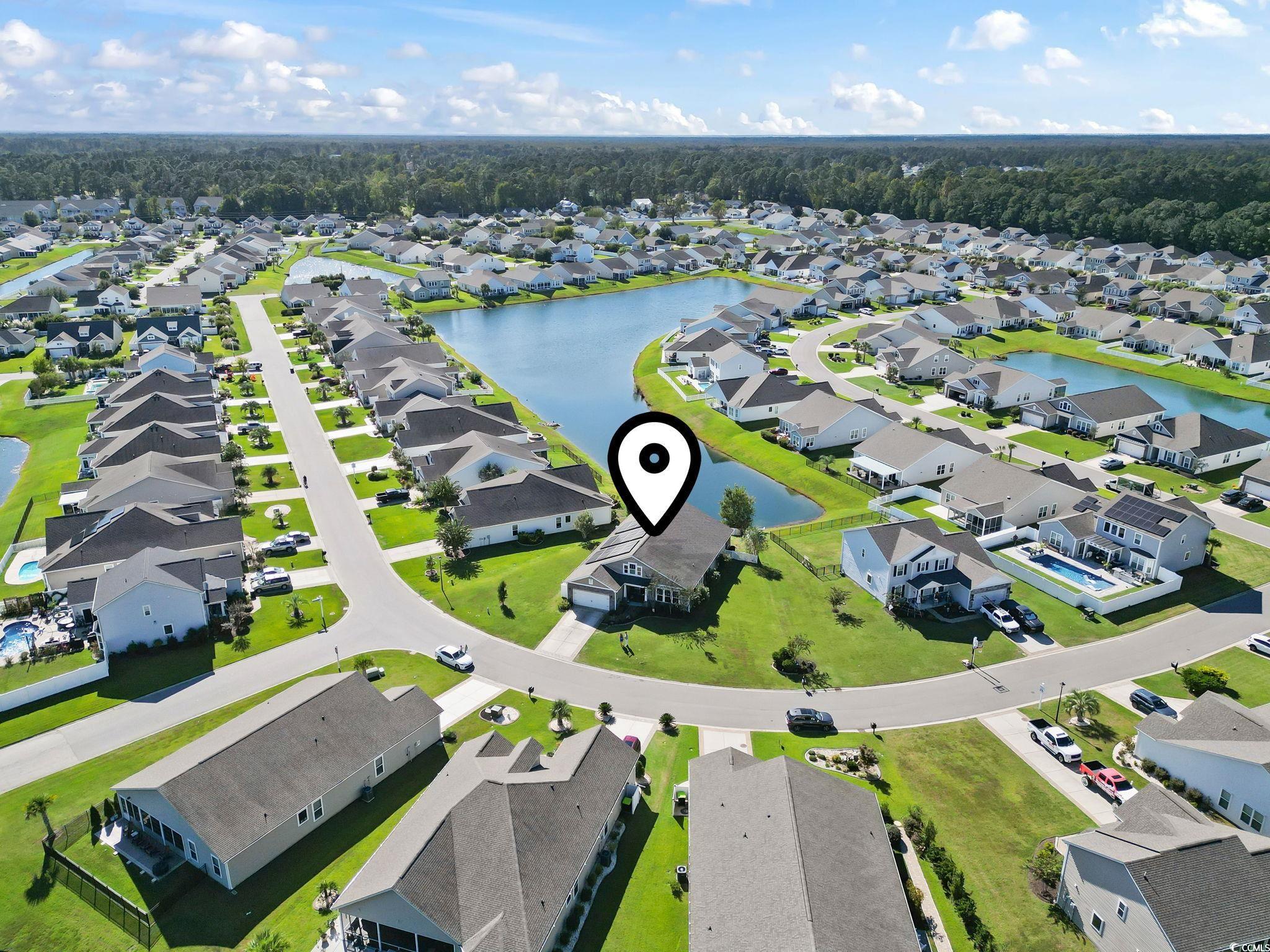 256 Copper Leaf Drive Myrtle Beach, SC 29588 - Photo 2 of 40 Aerial perspective of suburban area featuring a nearby body of water