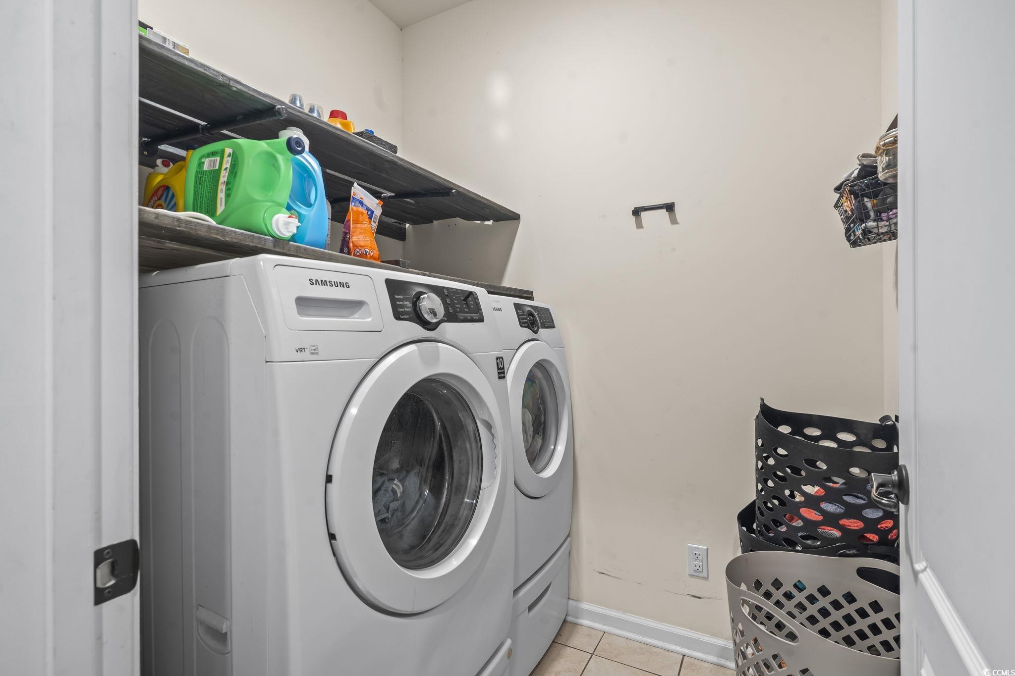 256 Copper Leaf Drive Myrtle Beach, SC 29588 - Photo 24 of 40 Laundry area featuring light tile patterned floors and independent washer and dryer