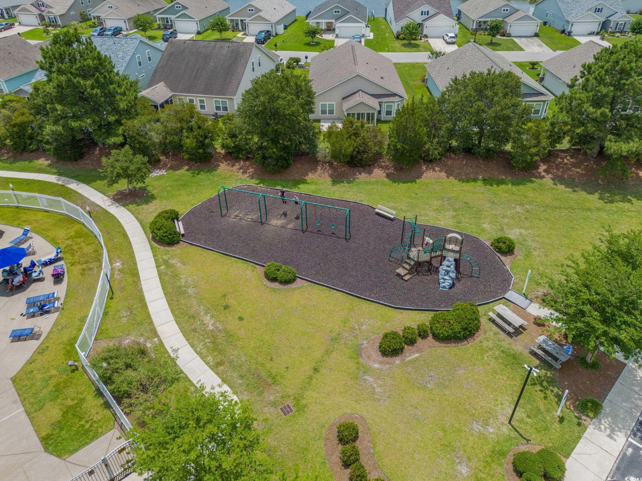 256 Copper Leaf Drive Myrtle Beach, SC 29588 - Photo 37 of 40 Aerial perspective of playground area featuring a community park