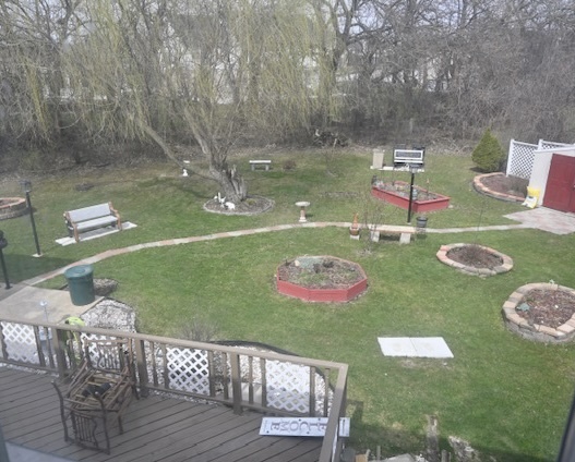 68 White Oaks Road Matteson, IL 60443 - Photo 16 of 39 a table and chairs sitting in the middle of yard