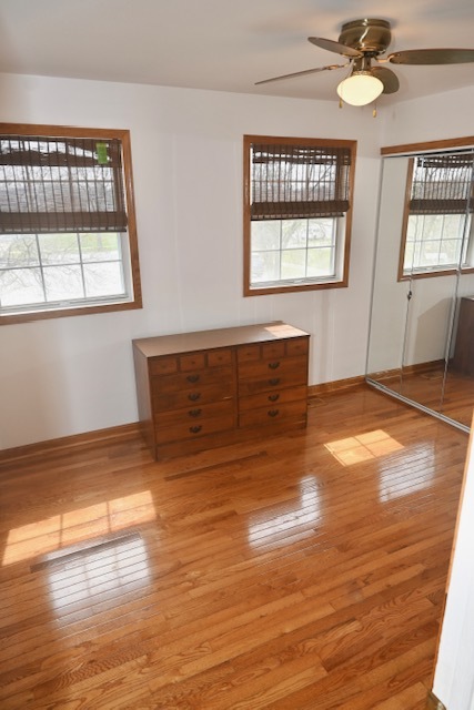 68 White Oaks Road Matteson, IL 60443 - Photo 30 of 39 a view of an empty room with wooden floor and a window