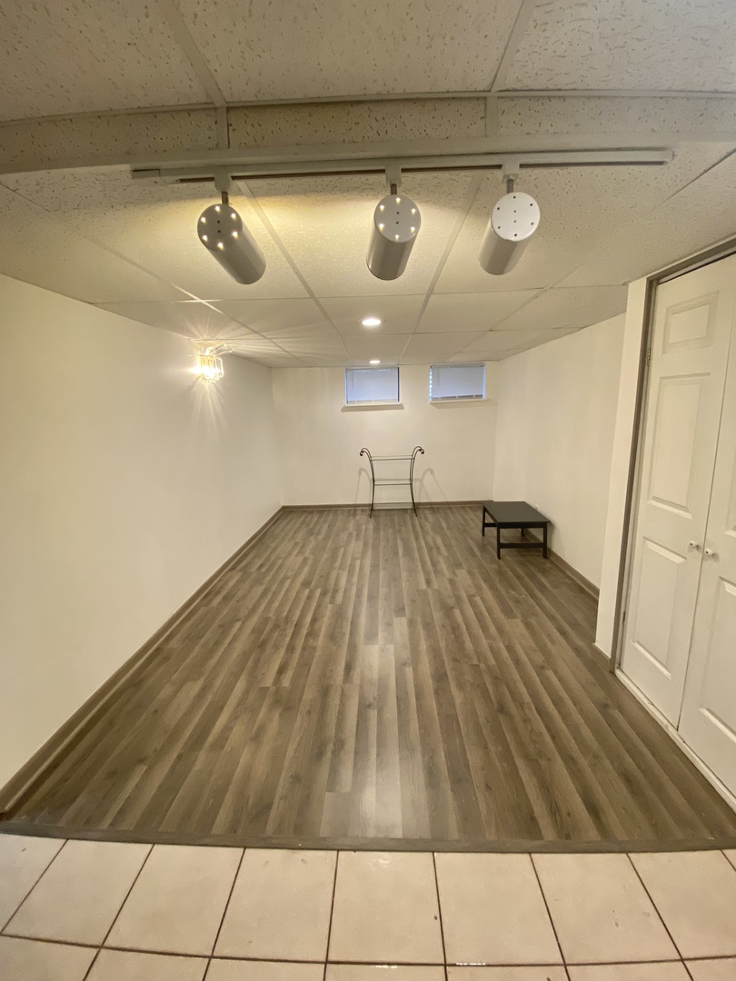 68 White Oaks Road Matteson, IL 60443 - Photo 34 of 39 a view of a room with wooden floor