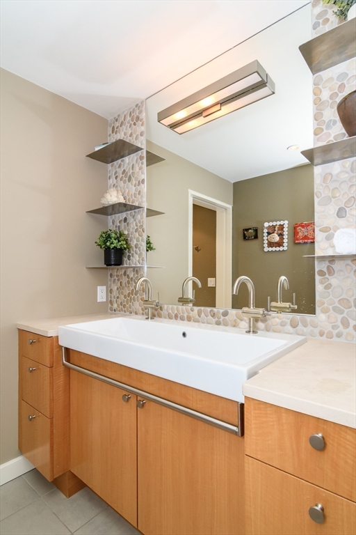 41 Grove Street Wayland, MA 01778 - Photo 11 of 24 a bathroom with a sink and a mirror