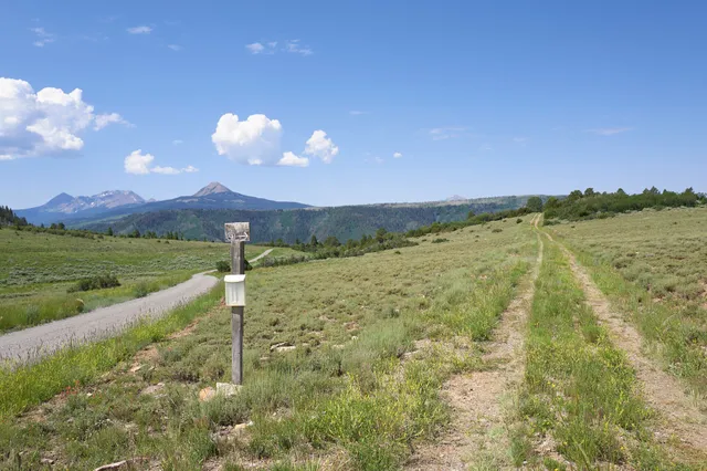 a view of a lake with a mountain in the background