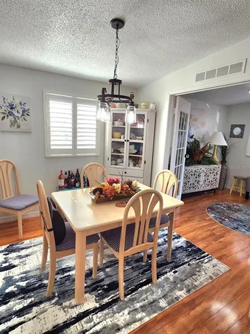 a kitchen with a stove and a sink
