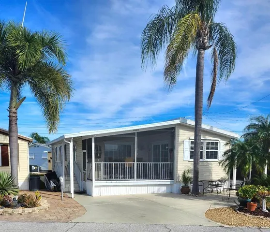 a house with a tree in front of it