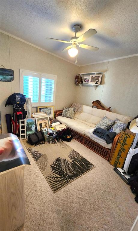 6513 Oregon Street Bradenton, FL 34207 - Photo 28 of 57 a bed room with a bed and a couch