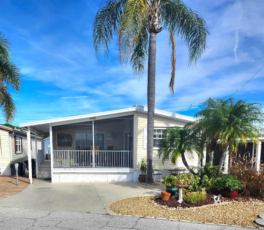 6513 Oregon Street Bradenton, FL 34207 - Photo 3 of 57 a view of a house with a patio