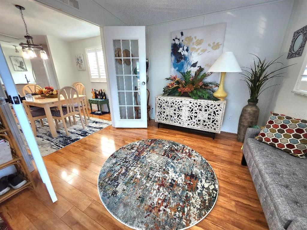 6513 Oregon Street Bradenton, FL 34207 - Photo 10 of 57 a view of living room with furniture and flowers