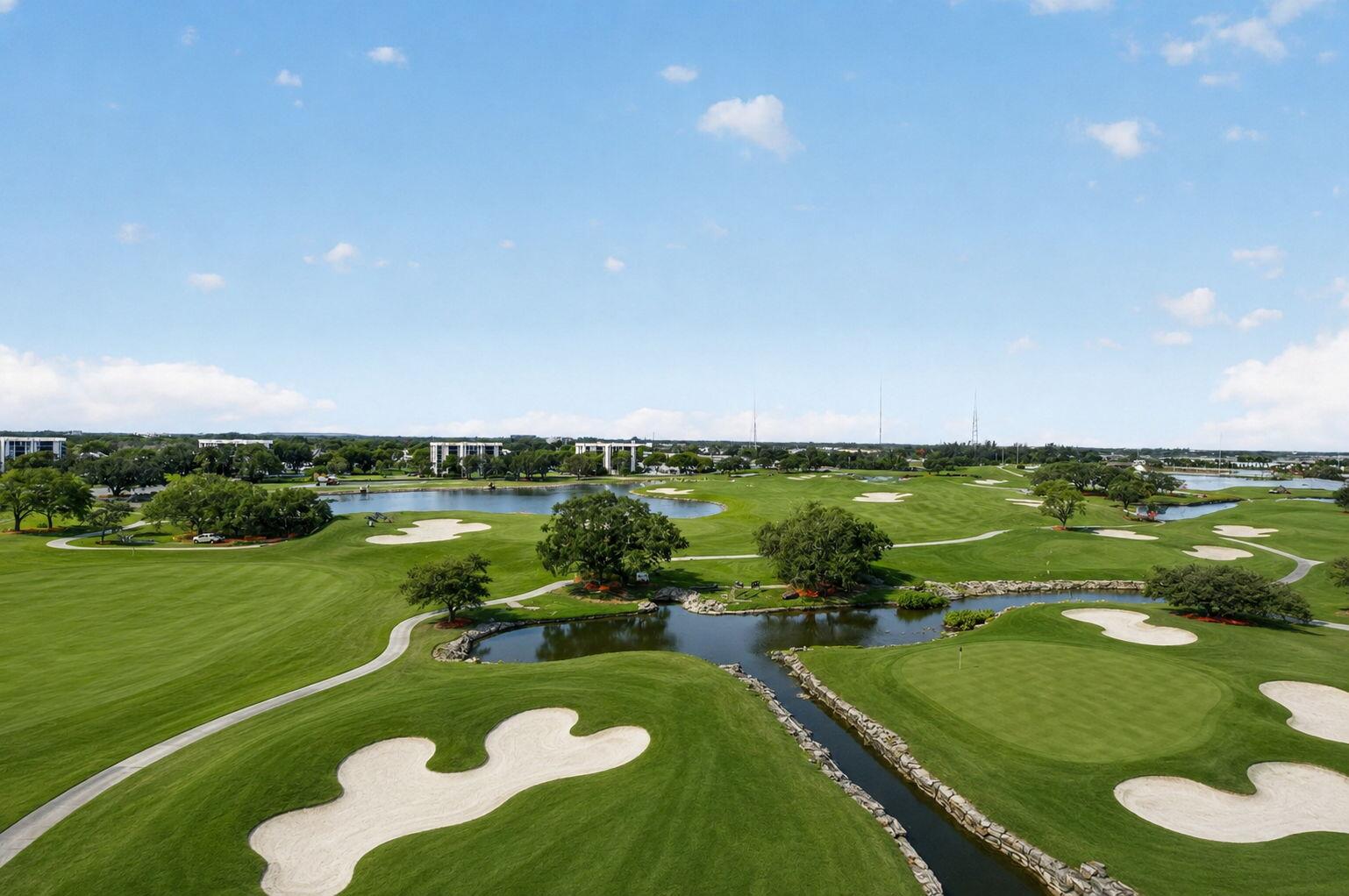 20155 Boca W Drive, Unit B701 Boca Raton, FL 33434 - Photo 41 of 78 a view of a lake with a city