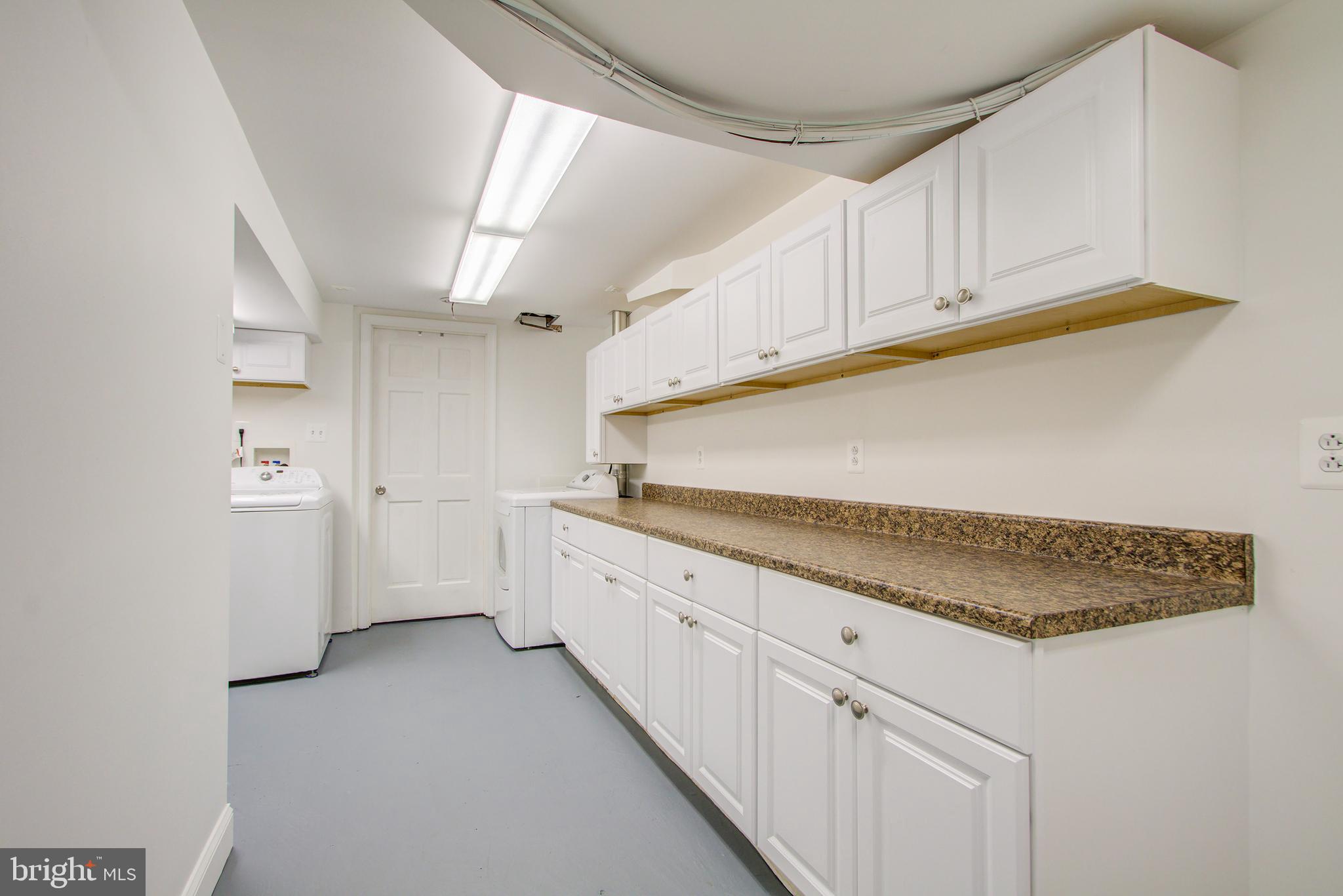 10015 Georgia Avenue Silver Spring, MD 20902 - Photo 29 of 34 laundry room - work space lower level