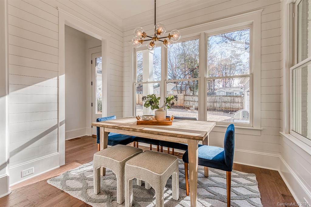 744 Ellsworth Road, Unit 46 Charlotte, NC 28211 - Photo 15 of 31 a view of a dining room with furniture window and outside view