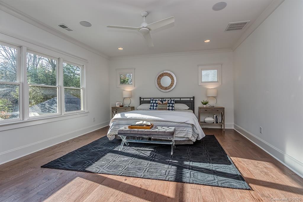 744 Ellsworth Road, Unit 46 Charlotte, NC 28211 - Photo 22 of 31 a bedroom with a bed and a window