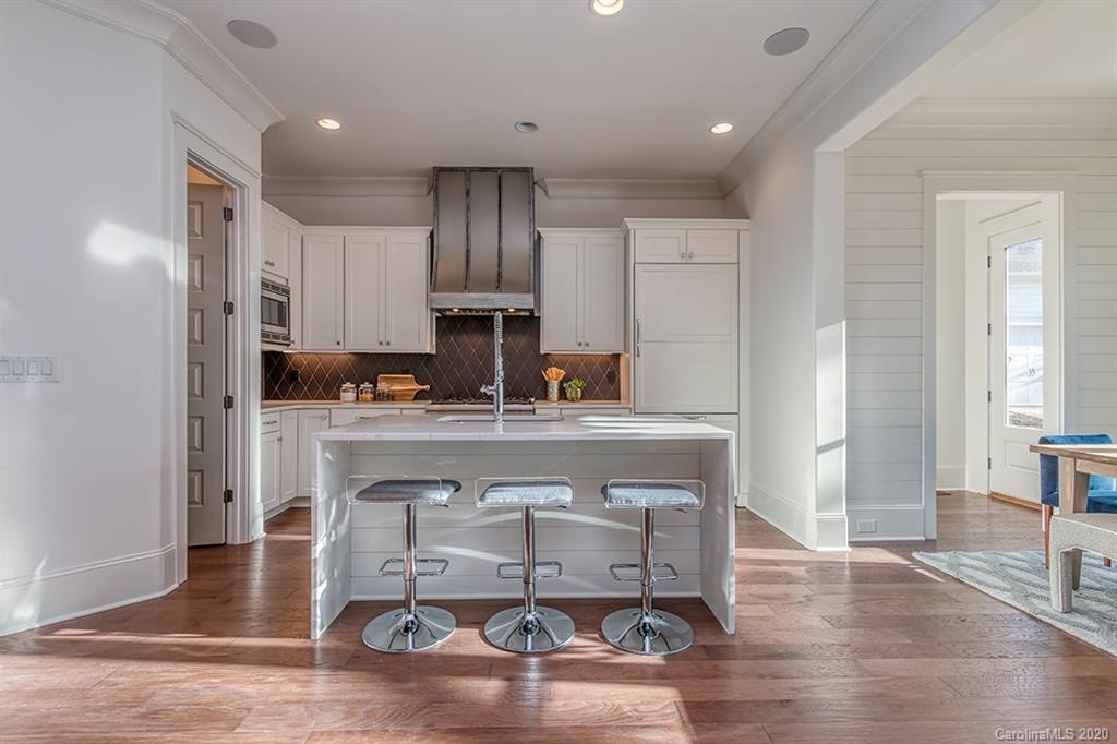 744 Ellsworth Road, Unit 46 Charlotte, NC 28211 - Photo 10 of 31 a view of living room with stainless steel appliances cabinets and wooden floor