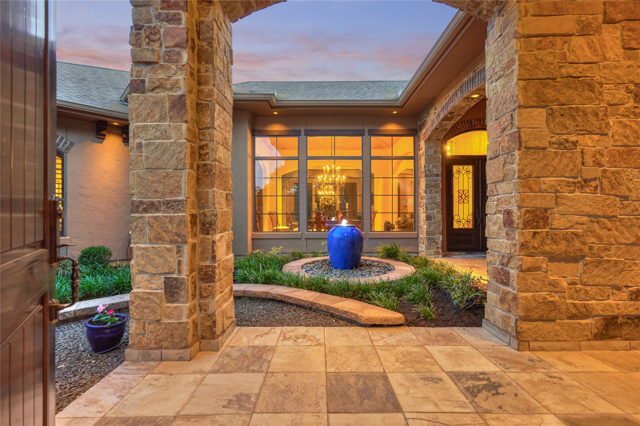 24803 Pearl Crest Lane Spring, TX 77389 - Photo 7 of 50 Private, covered courtyard entrance with lighted courtyard fountain.