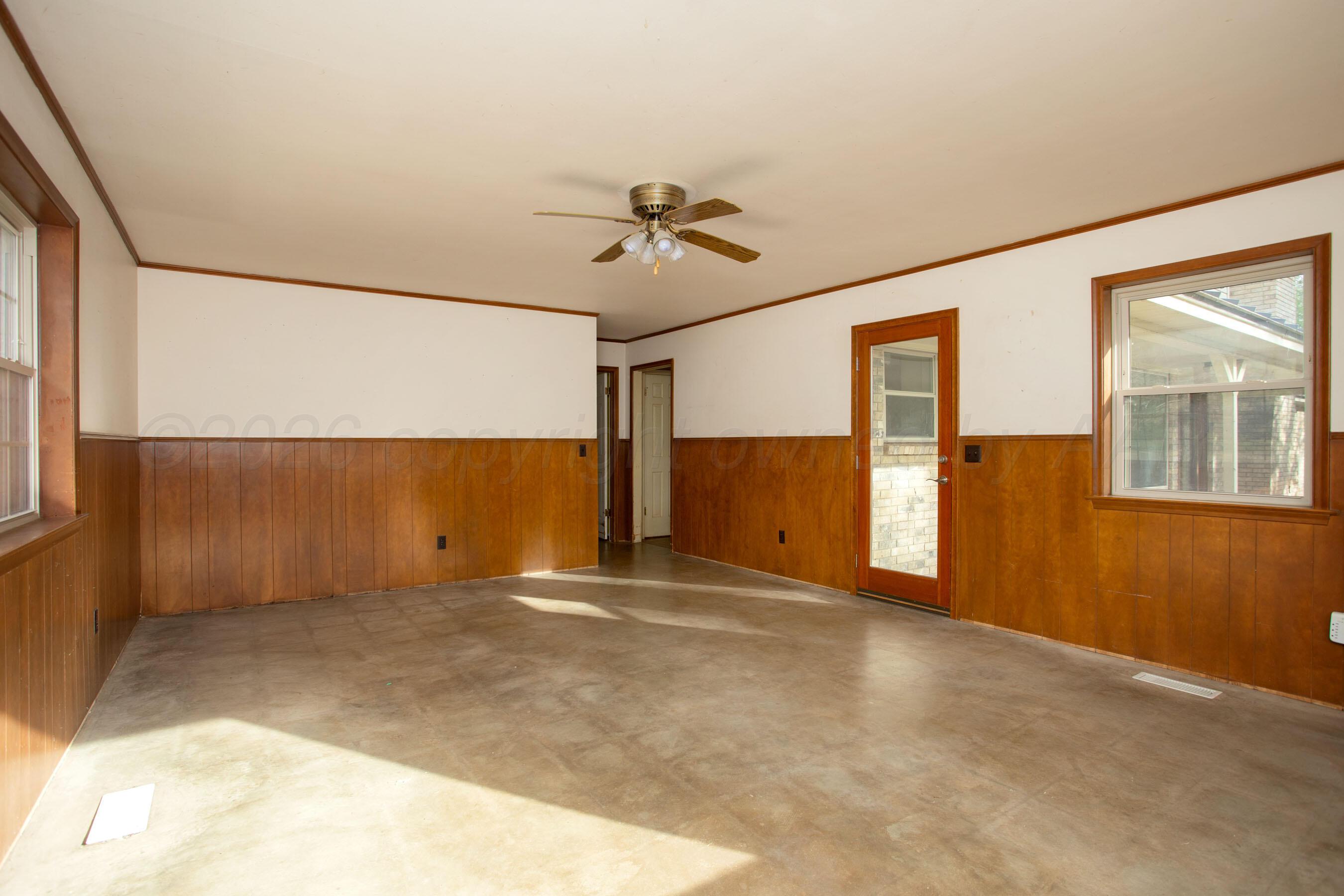 116 Dewey Avenue Amarillo, TX 79124 - Photo 11 of 35 a view of an empty room with a window