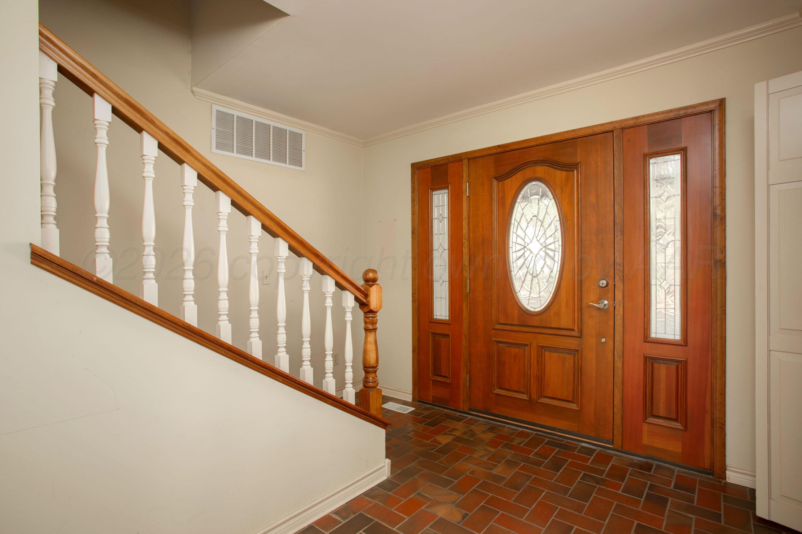 116 Dewey Avenue Amarillo, TX 79124 - Photo 15 of 35 a view of a hallway with wooden floor and entryway