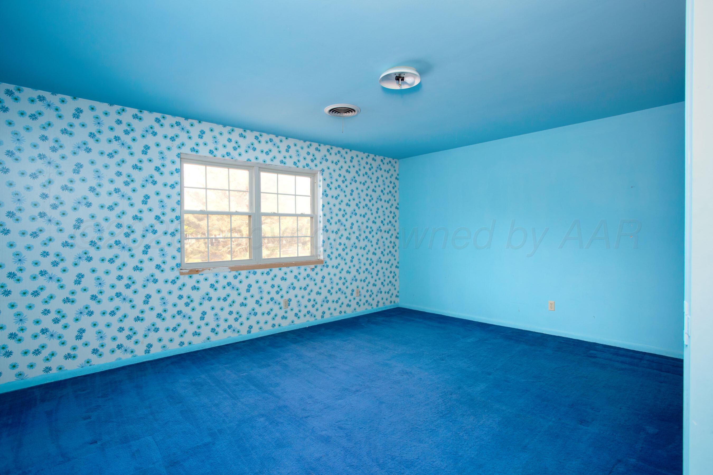 116 Dewey Avenue Amarillo, TX 79124 - Photo 17 of 35 an empty room with a window