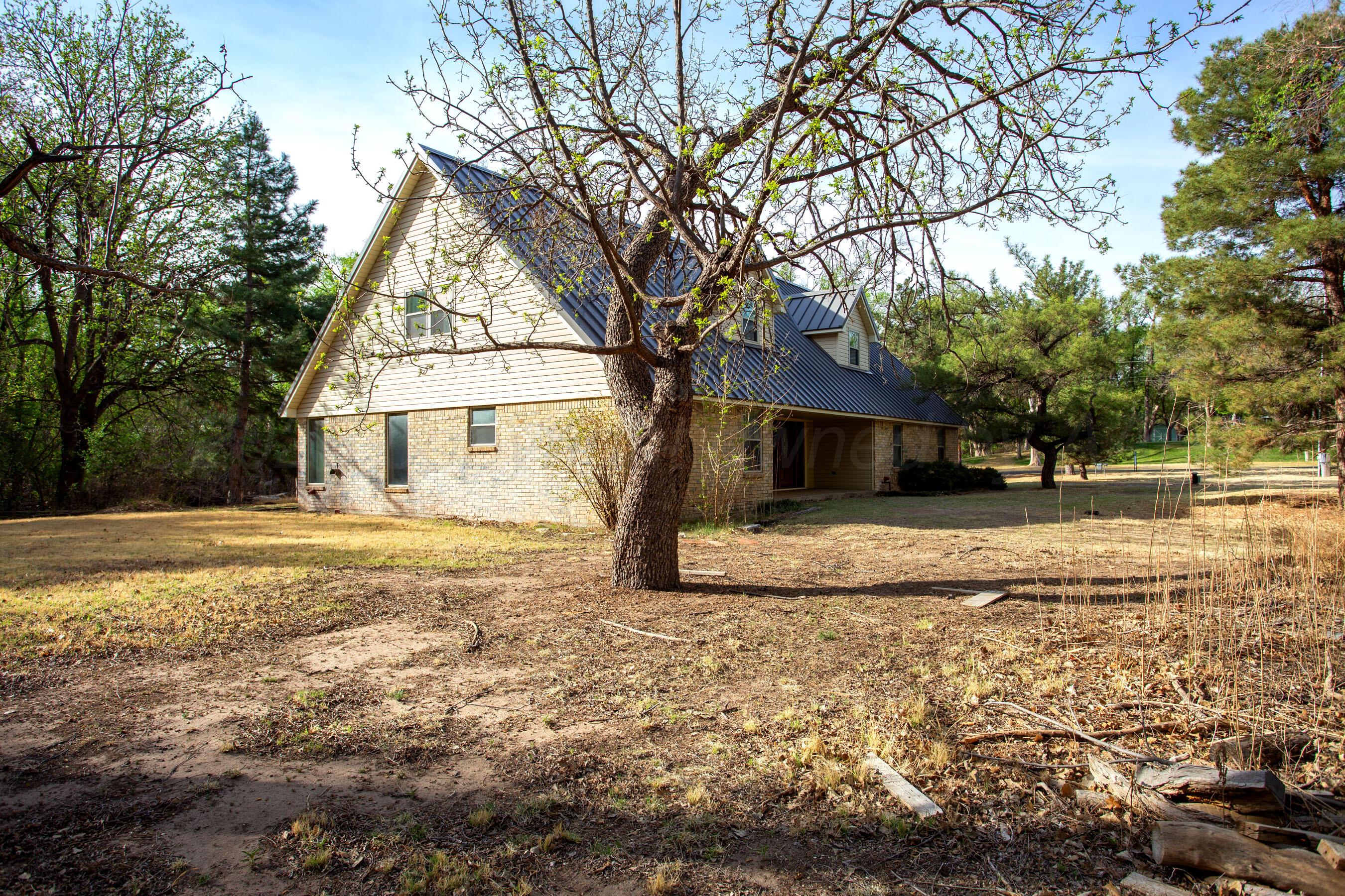 116 Dewey Avenue Amarillo, TX 79124 - Photo 27 of 35 a view of a house with a yard