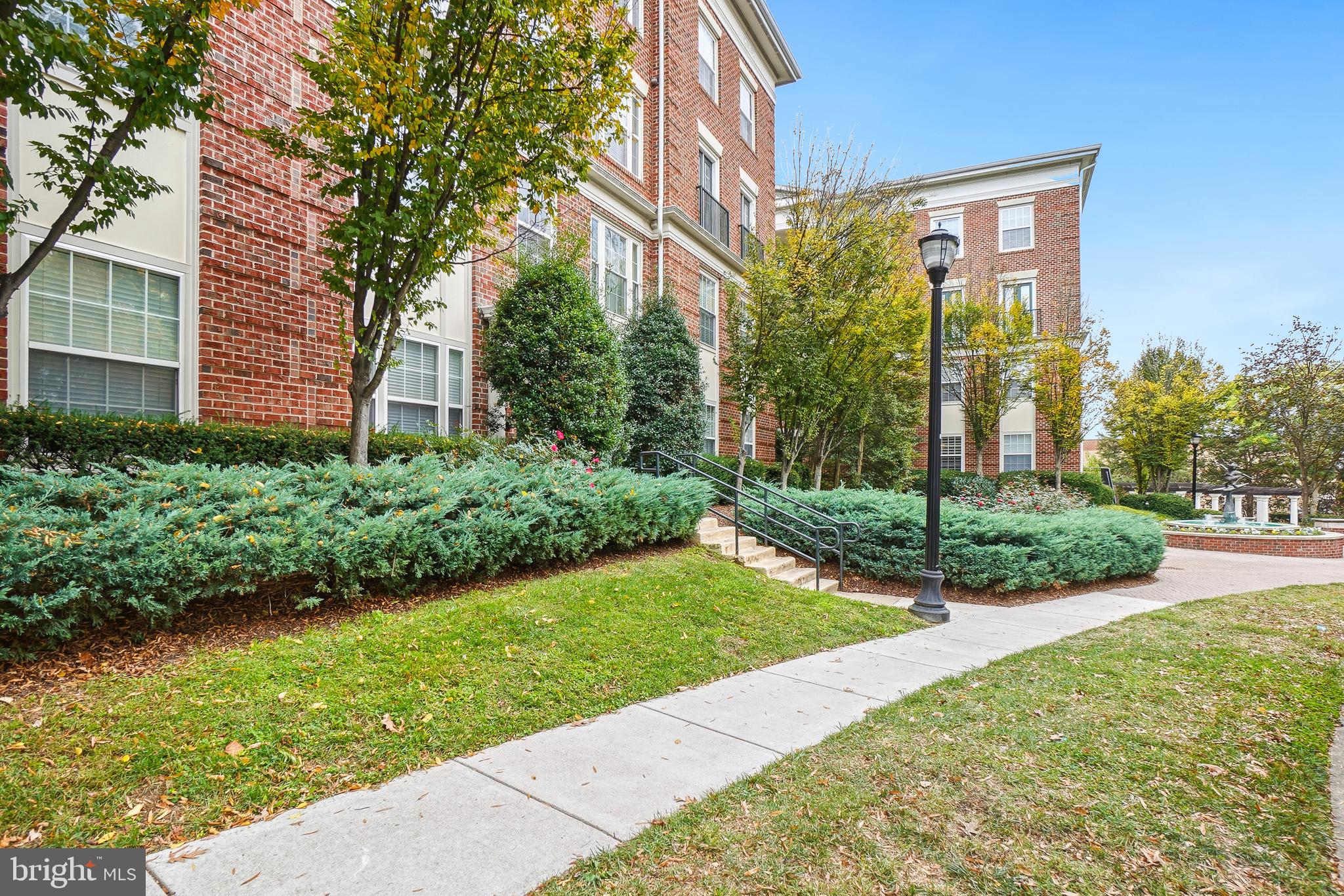 27 Booth Street, Unit 345 Gaithersburg, MD 20878 - Photo 32 of 40 a view of a house with a yard