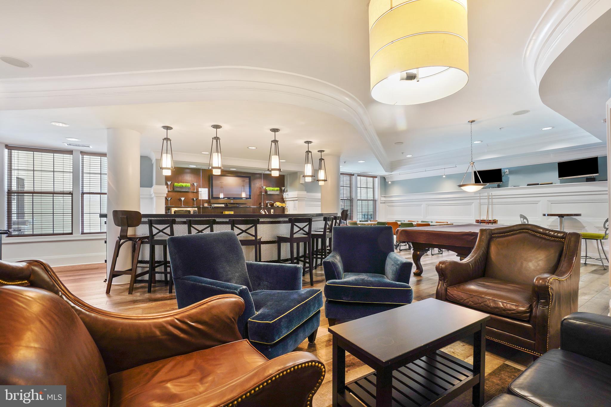 27 Booth Street, Unit 345 Gaithersburg, MD 20878 - Photo 35 of 40 a living room with furniture kitchen and a table