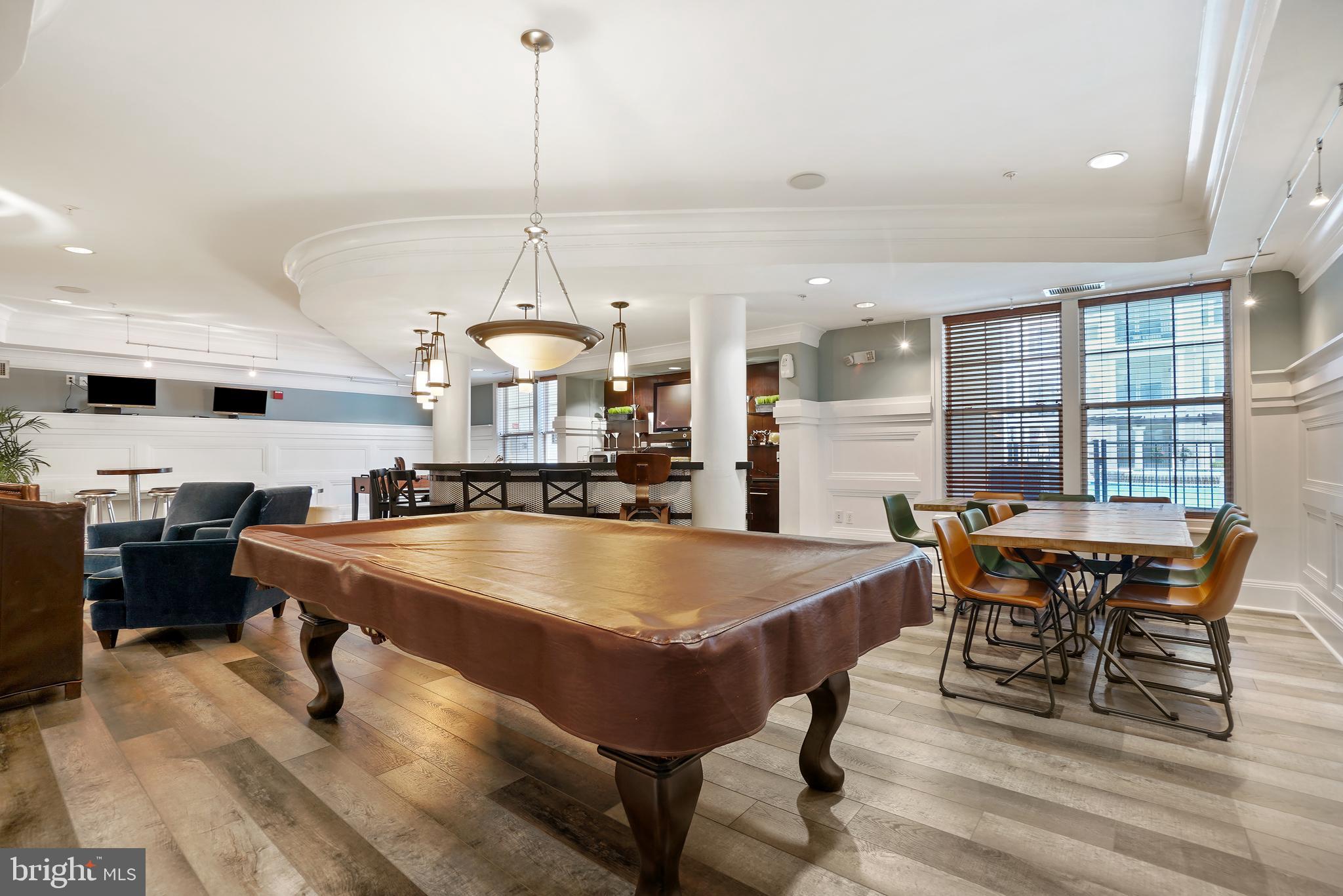 27 Booth Street, Unit 345 Gaithersburg, MD 20878 - Photo 36 of 40 a large kitchen with a table and chairs