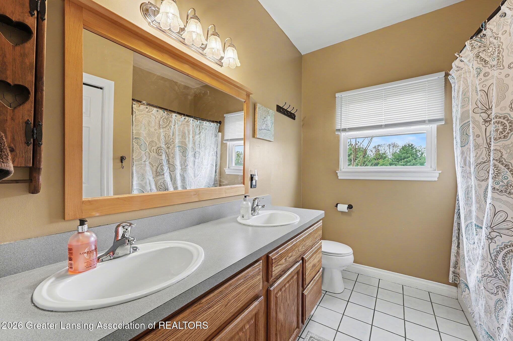 3931 Weatherby Road Stockbridge, MI 49285 - Photo 12 of 26 Bathroom 1