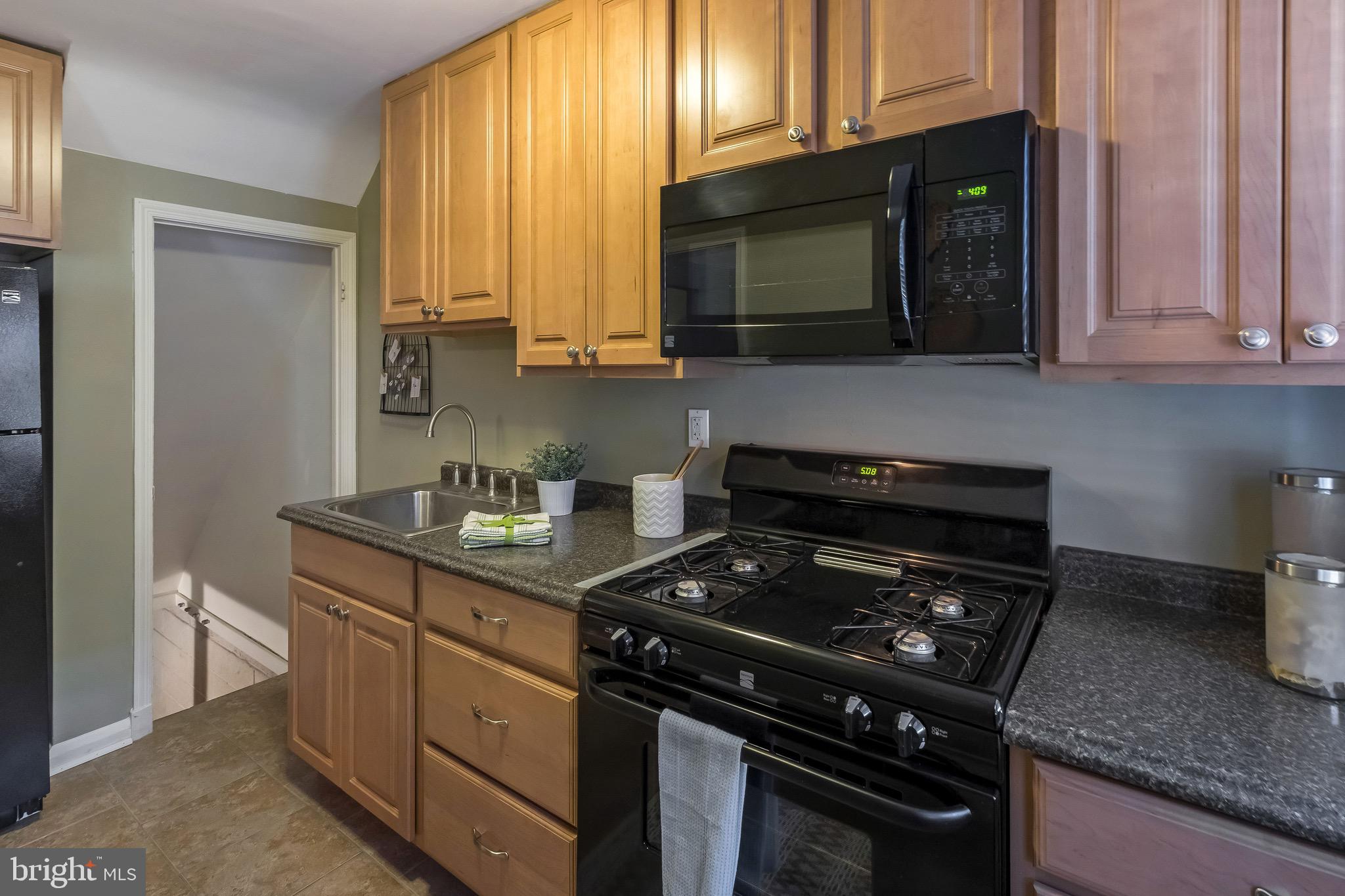 1920 Frames Road Baltimore, MD 21222 - Photo 9 of 27 Efficient kitchen leading to the basement
