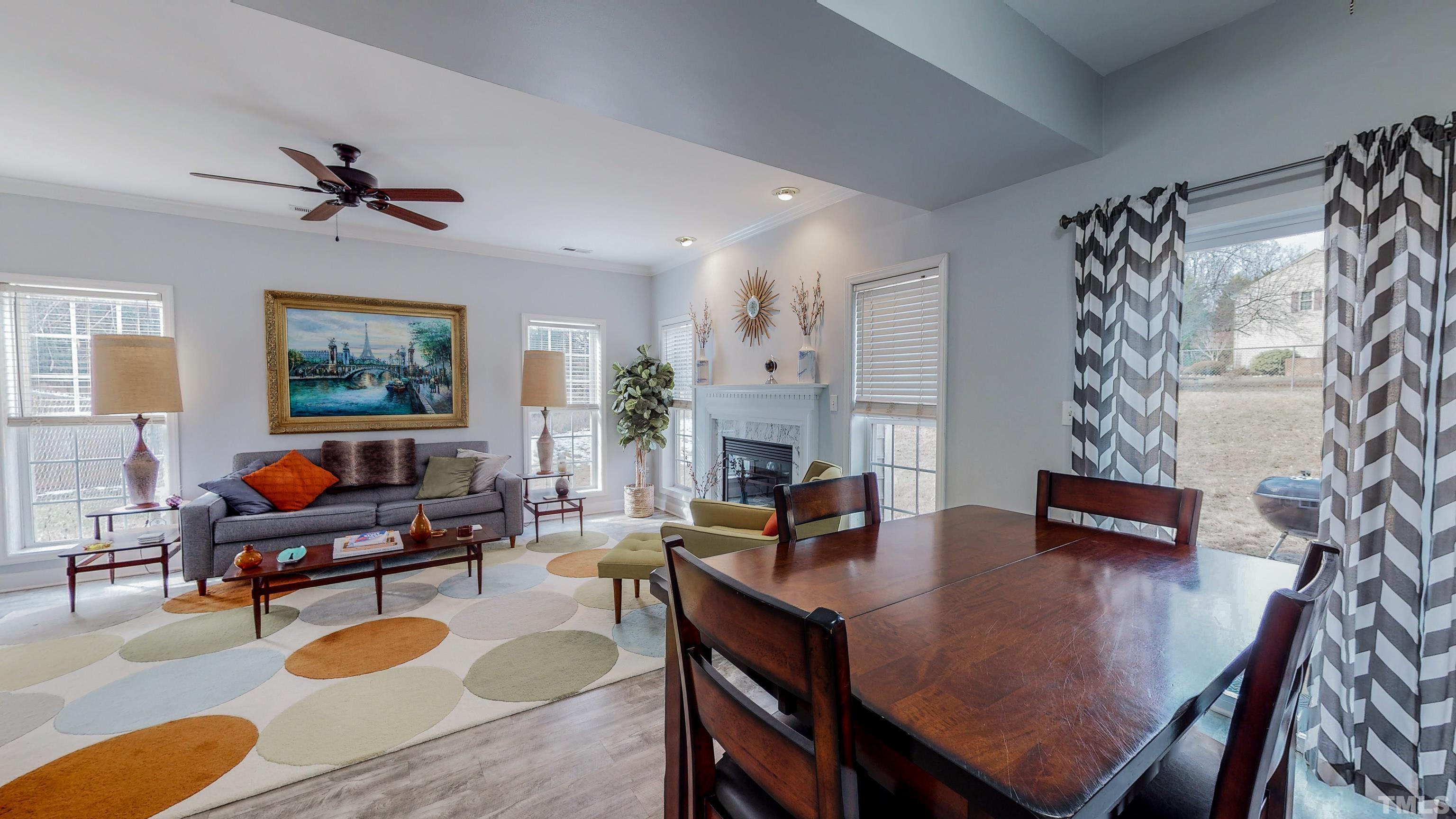 145 Deep Creek Point Rougemont, NC 27572 - Photo 11 of 52 a living room with furniture and a flat screen tv