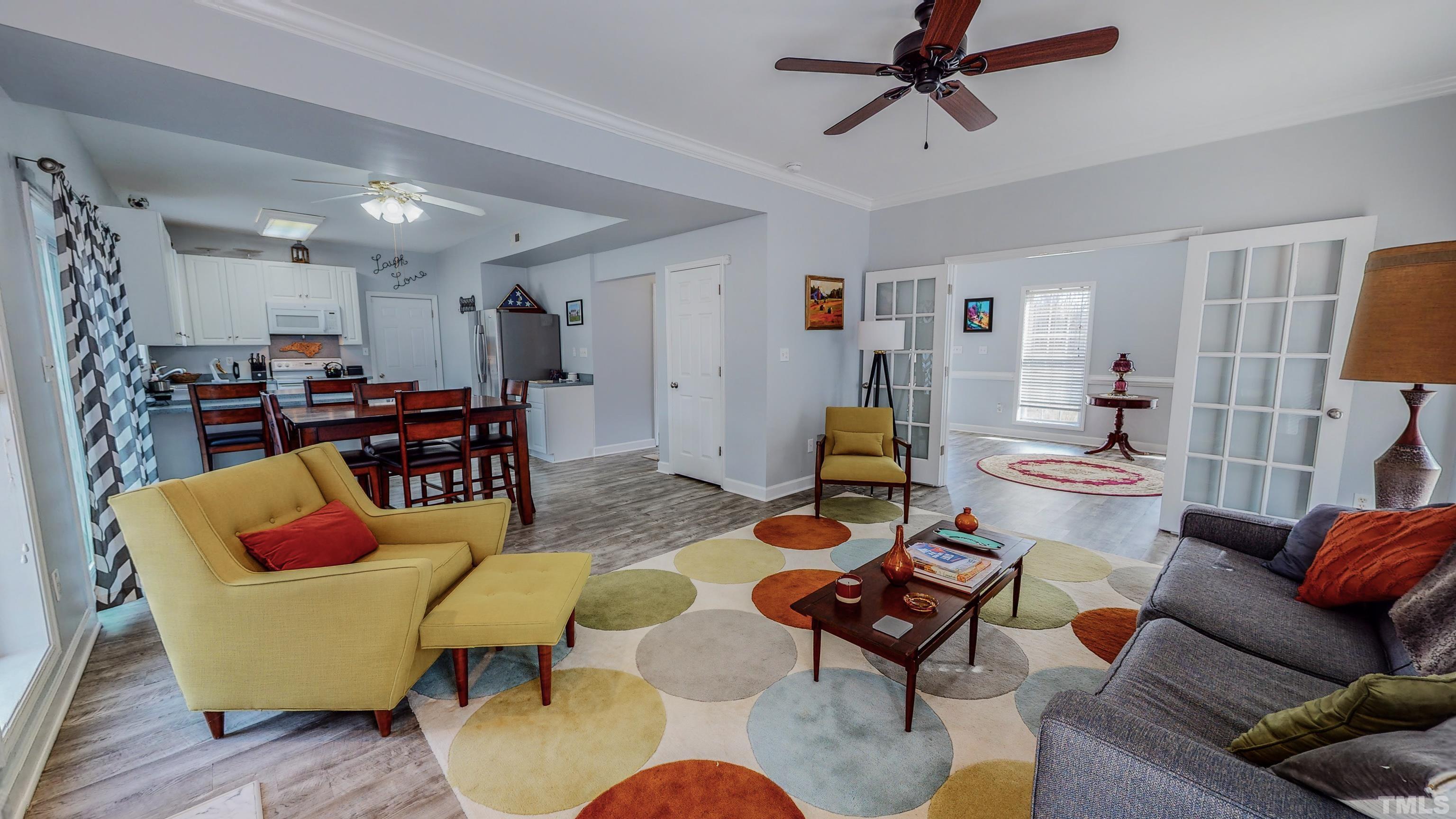145 Deep Creek Point Rougemont, NC 27572 - Photo 12 of 52 a living room with furniture kitchen view and a window