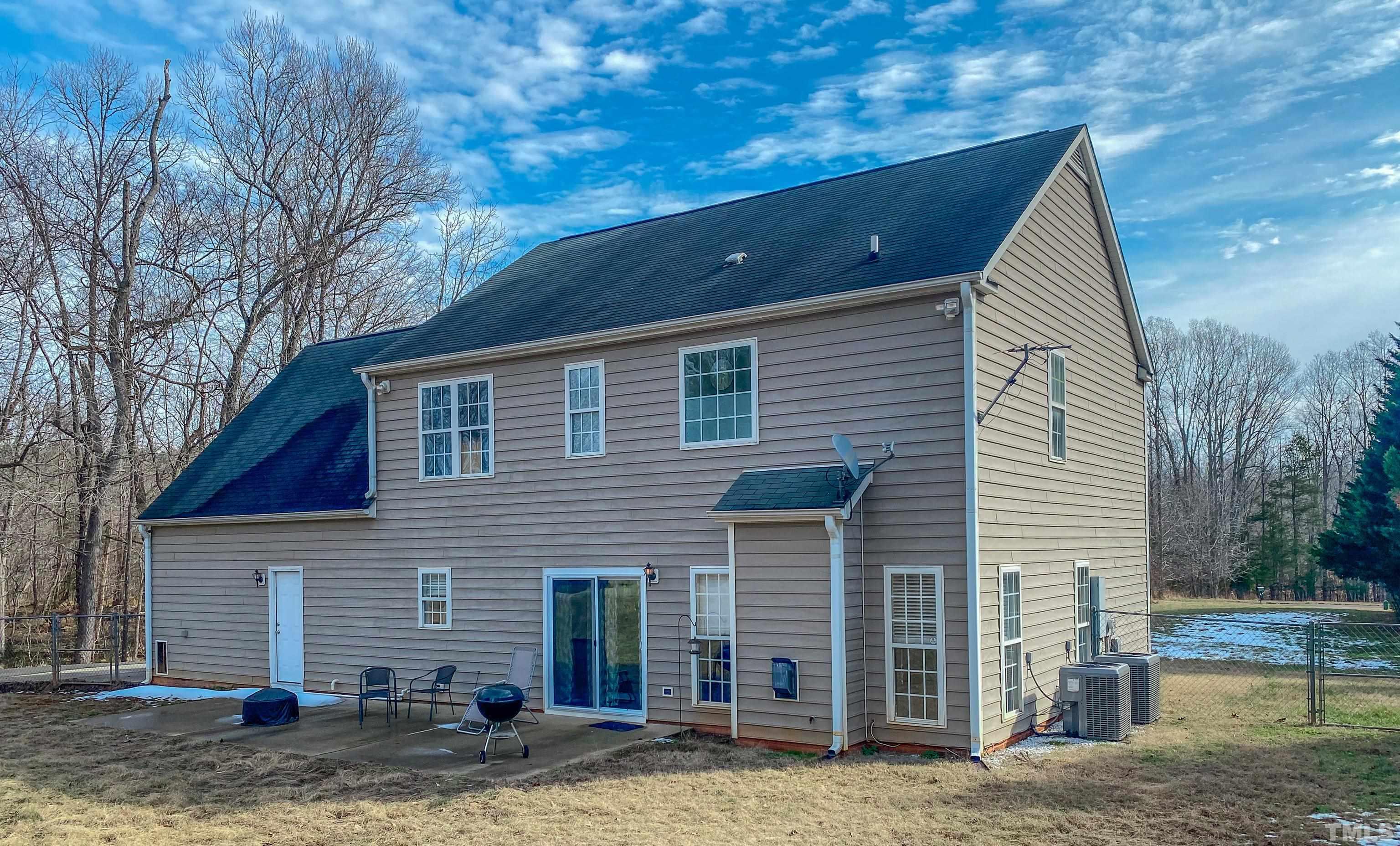 145 Deep Creek Point Rougemont, NC 27572 - Photo 22 of 52 a view of a house with a yard
