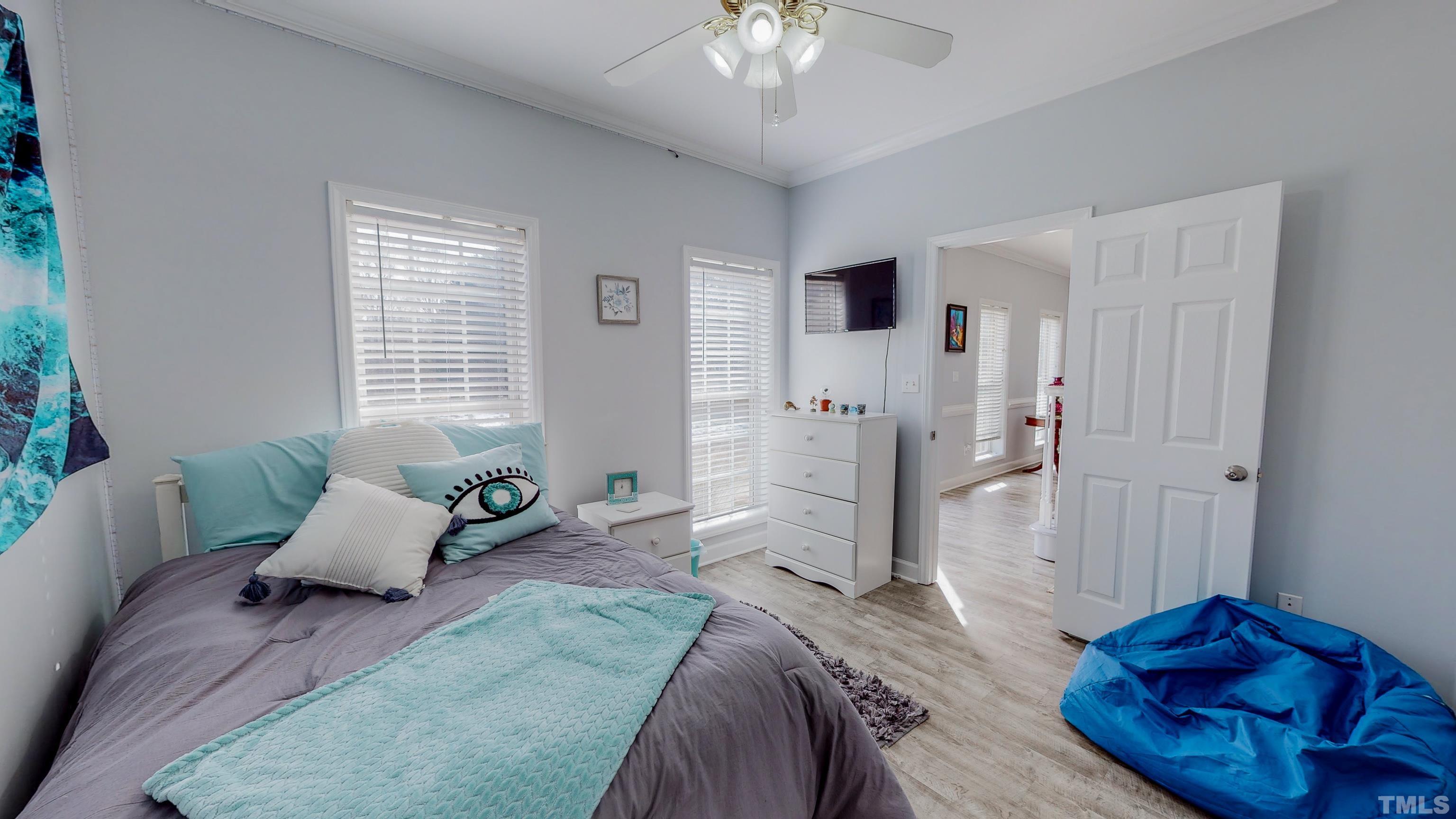 145 Deep Creek Point Rougemont, NC 27572 - Photo 25 of 52 a spacious bedroom with a bed and a couch