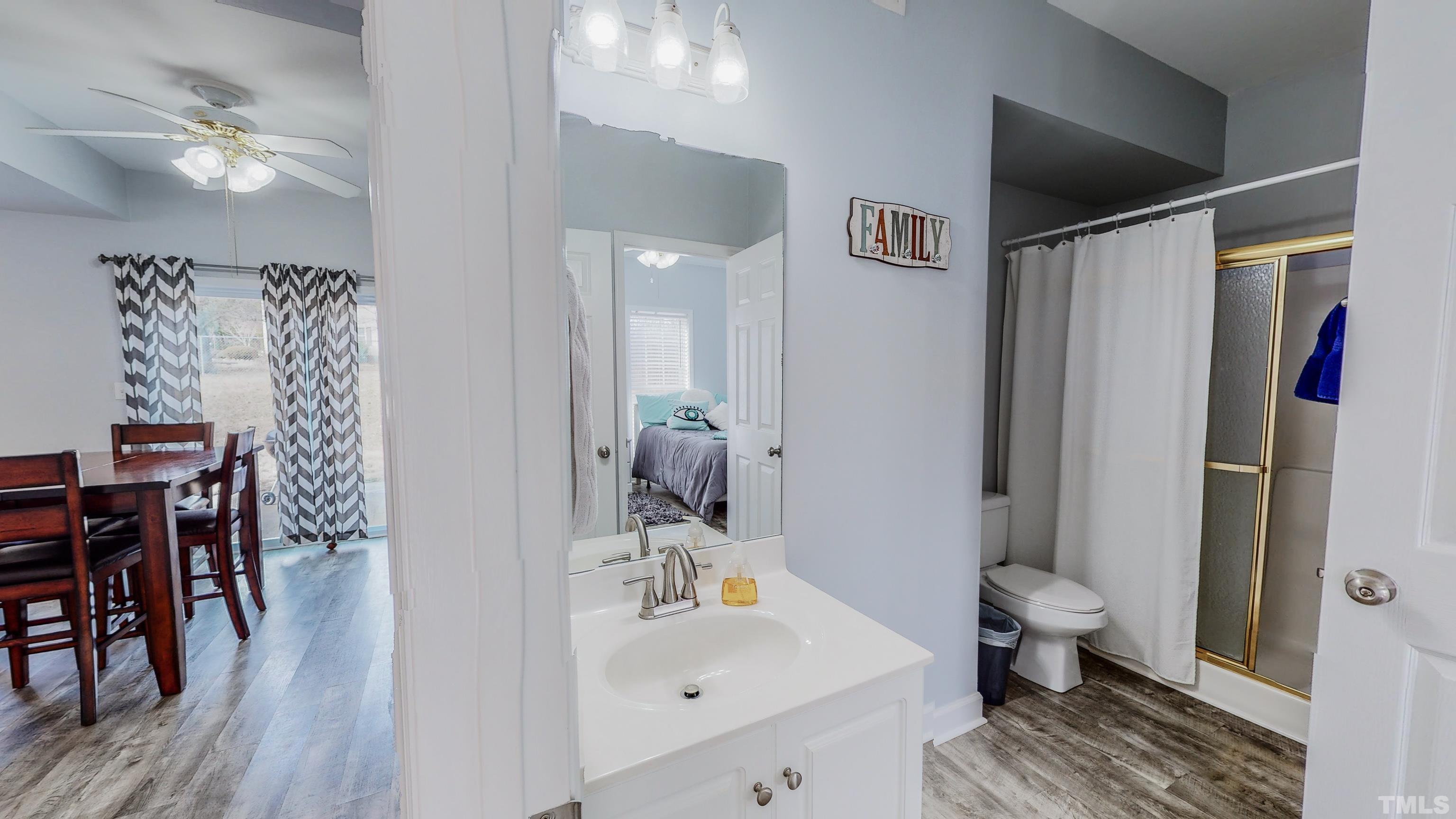 145 Deep Creek Point Rougemont, NC 27572 - Photo 27 of 52 a bathroom with a sink toilet and shower