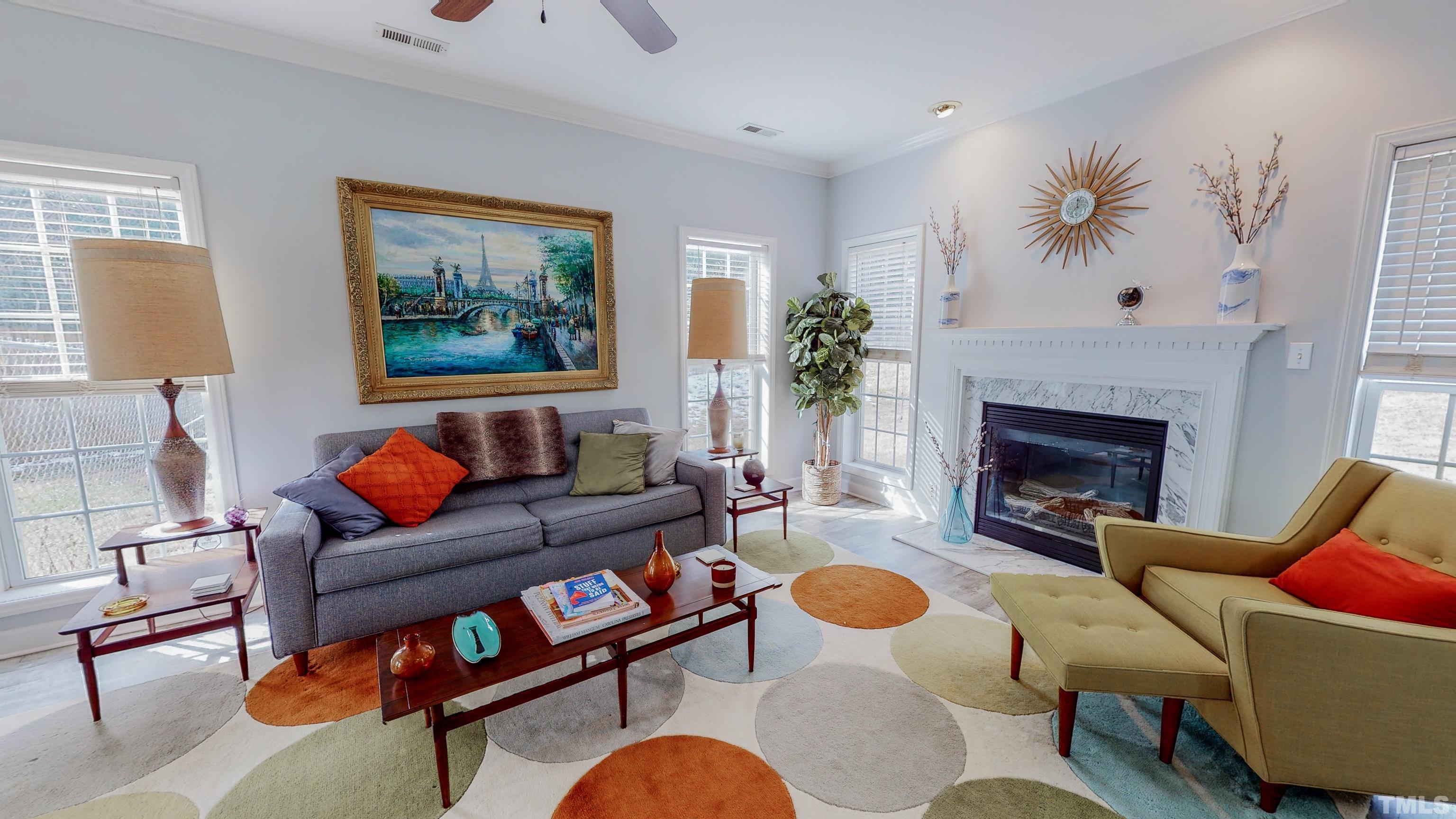 145 Deep Creek Point Rougemont, NC 27572 - Photo 3 of 52 a living room with furniture and a fireplace
