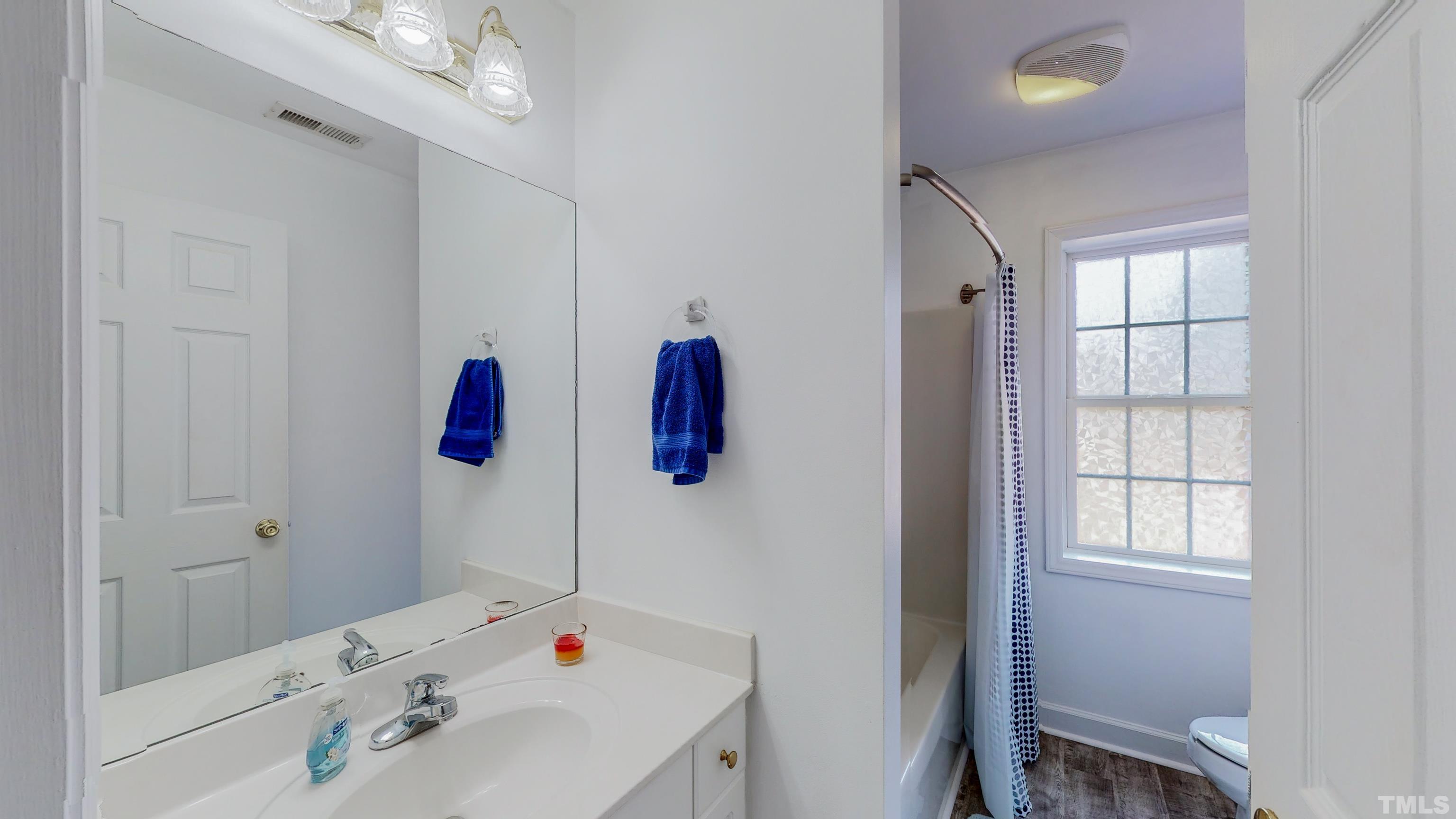 145 Deep Creek Point Rougemont, NC 27572 - Photo 33 of 52 a bathroom with a sink and a shower