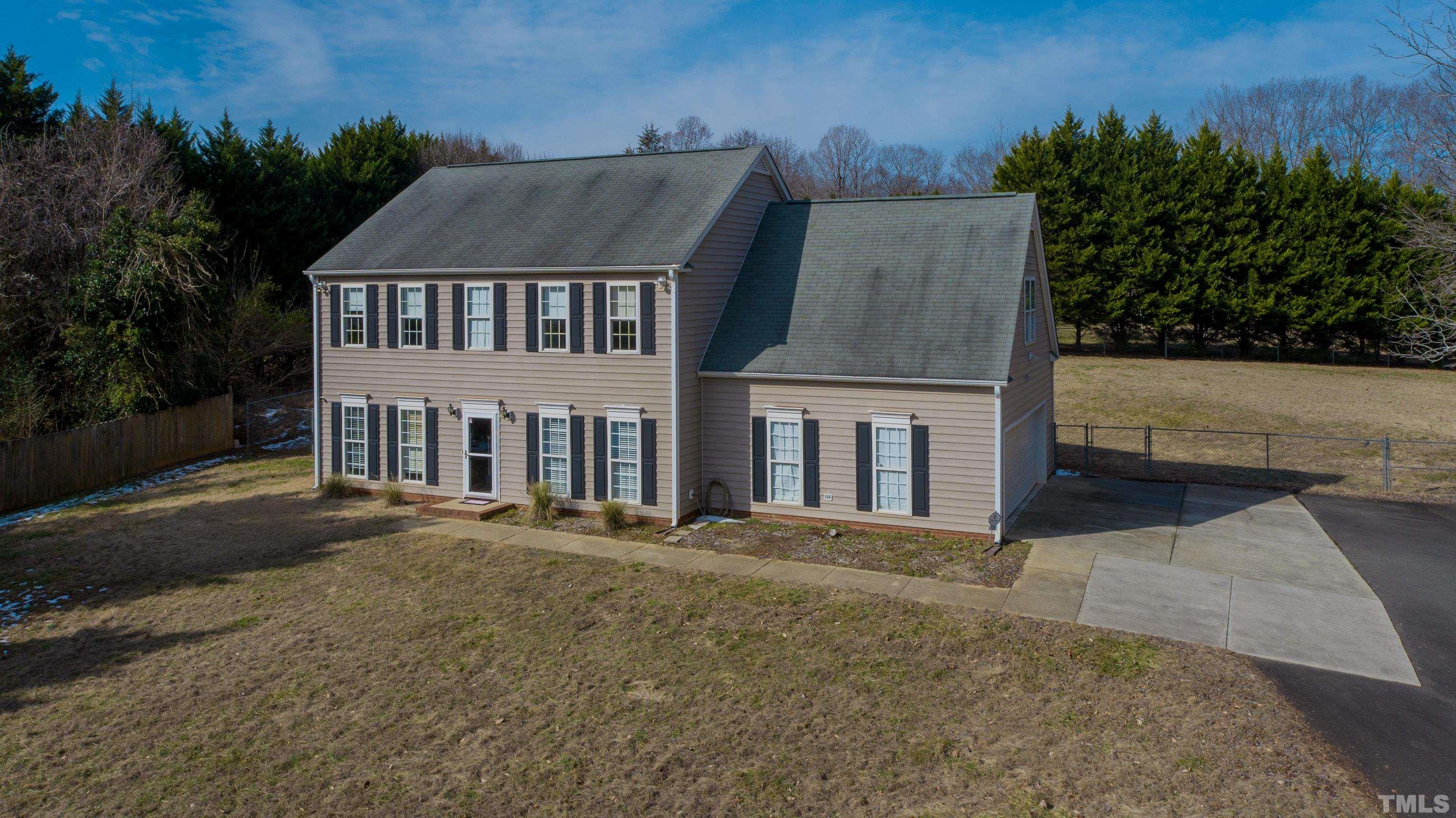 145 Deep Creek Point Rougemont, NC 27572 - Photo 39 of 52 front view of house with a yard