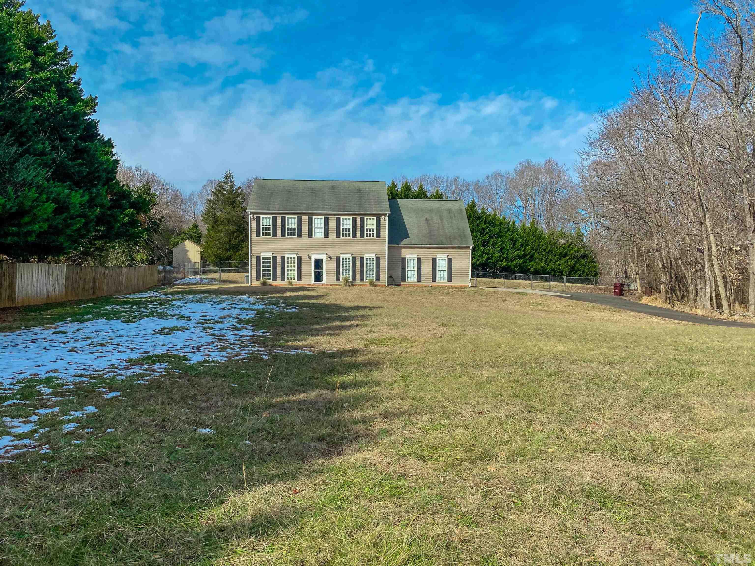 145 Deep Creek Point Rougemont, NC 27572 - Photo 41 of 52 a view of a house with backyard and trees