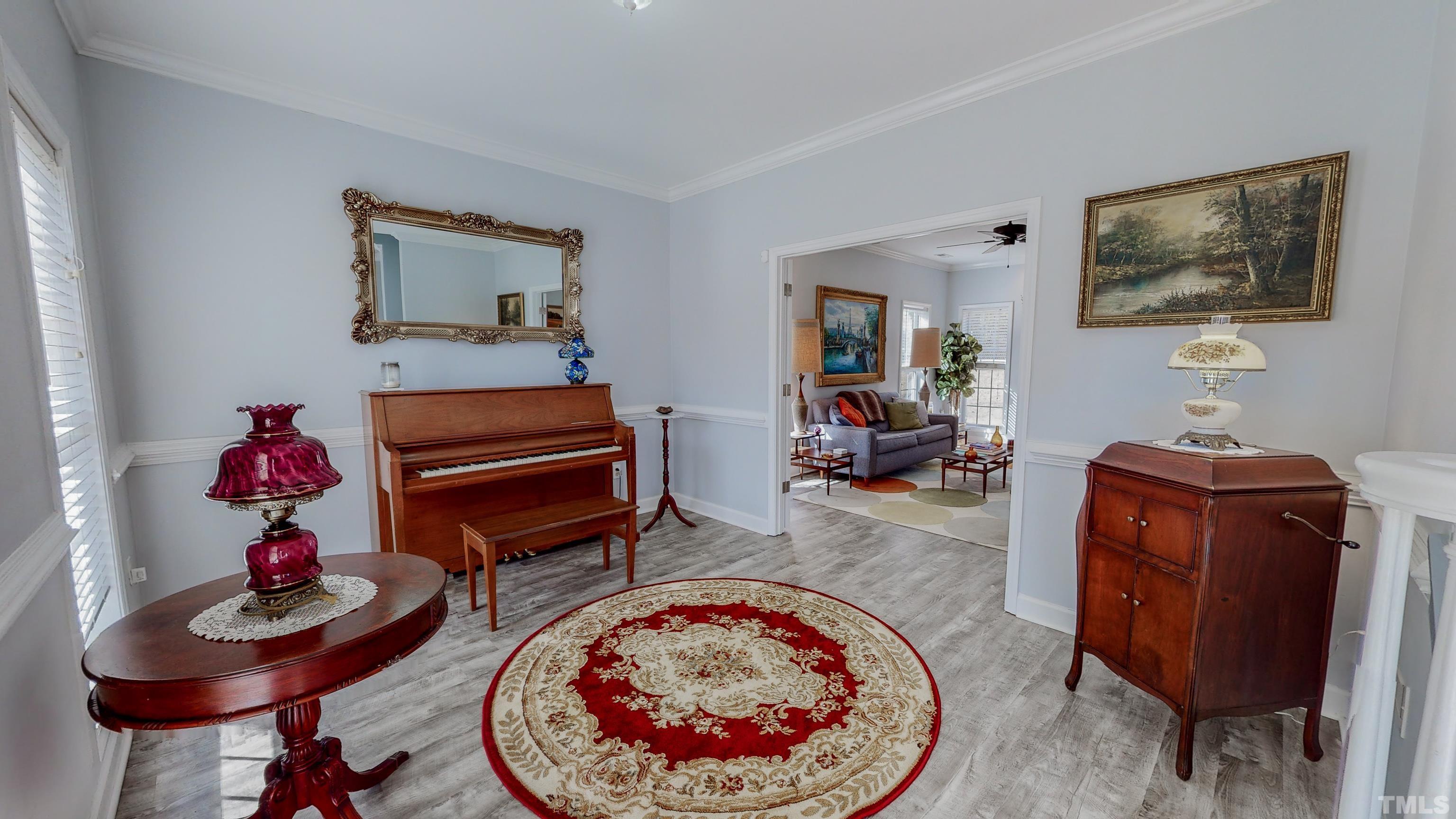 145 Deep Creek Point Rougemont, NC 27572 - Photo 42 of 52 a living room with furniture and a wooden floor