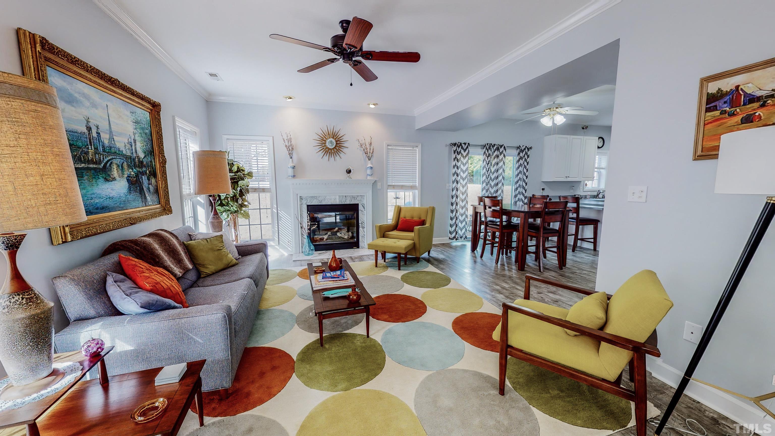 145 Deep Creek Point Rougemont, NC 27572 - Photo 44 of 52 a living room with furniture and a fireplace