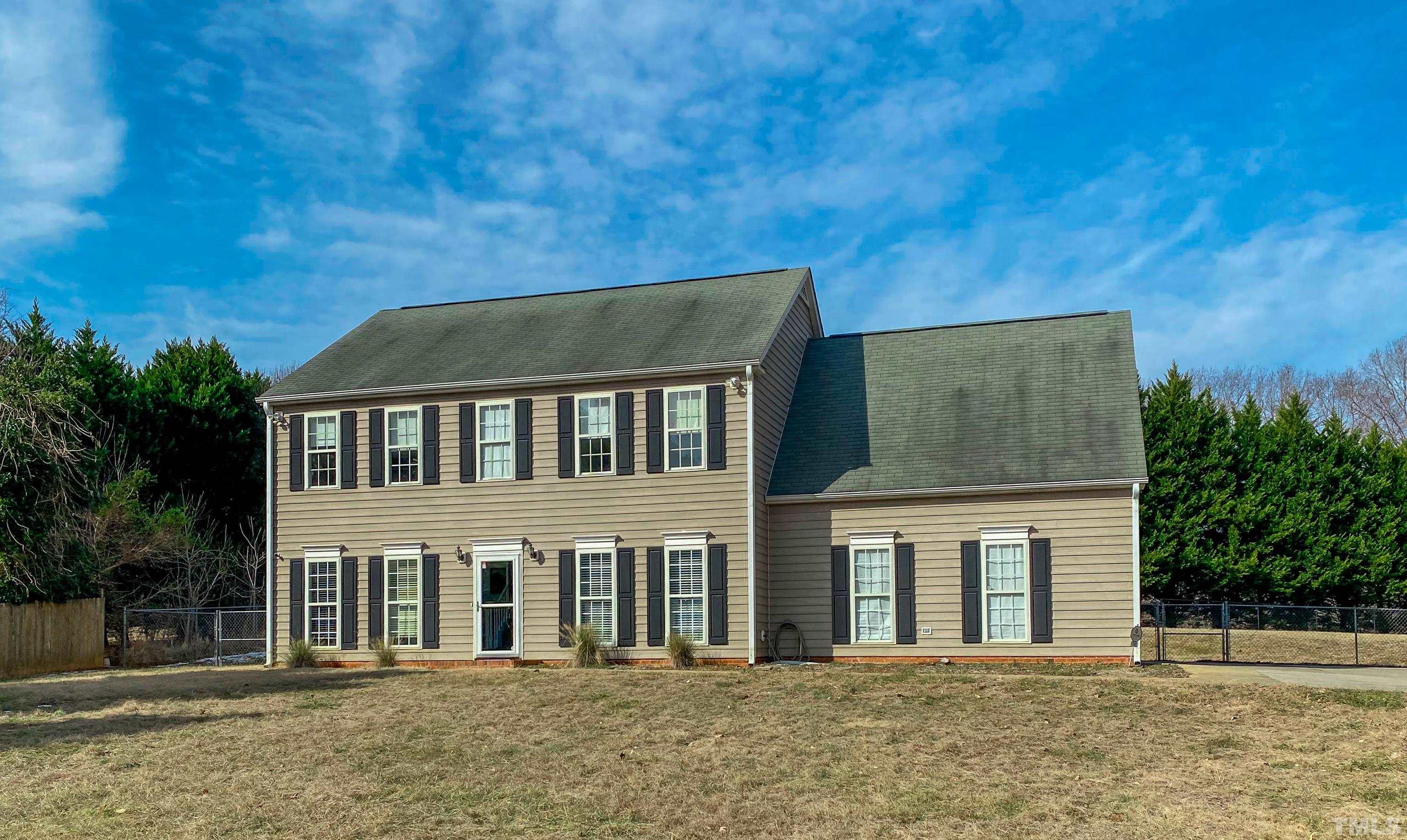 145 Deep Creek Point Rougemont, NC 27572 - Photo 52 of 52 a brick house with a large windows