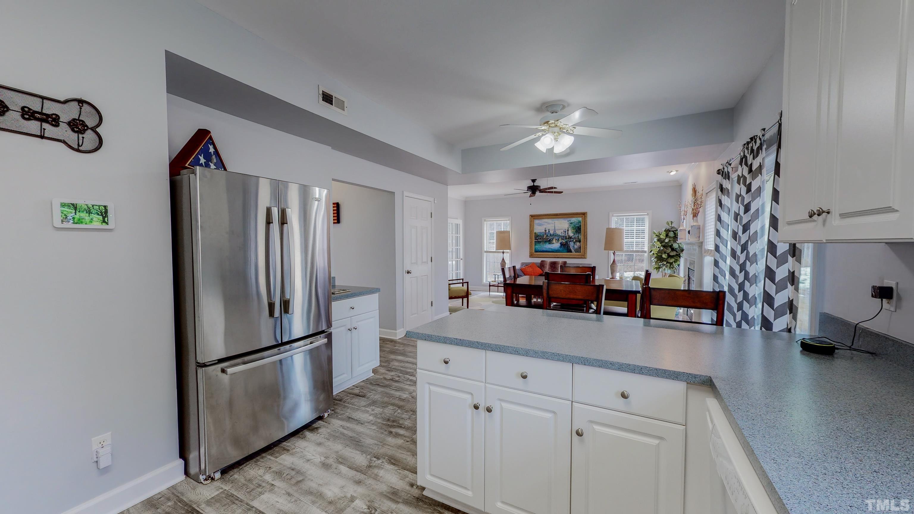 145 Deep Creek Point Rougemont, NC 27572 - Photo 7 of 52 a kitchen with refrigerator and window