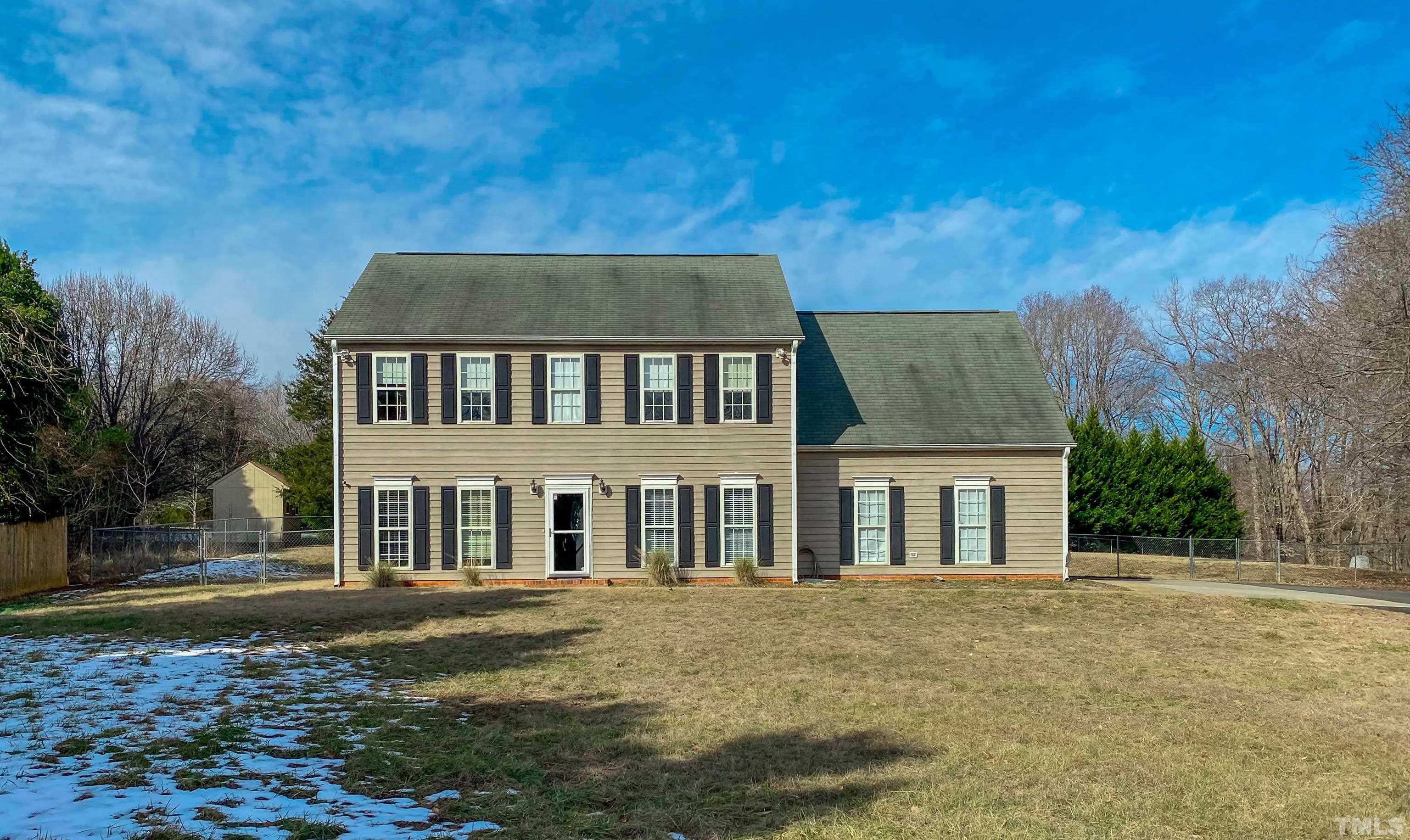 145 Deep Creek Point Rougemont, NC 27572 - Photo 8 of 52 front view of a house with a yard