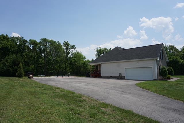 Large two car garage with plenty of extra parking. 